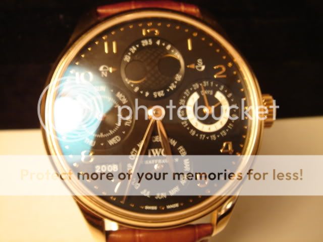 IWC PORTUGUESSE PERPETUAL CALENDAR IN 18K GOLD WITH BRN STRAP...CLASSY